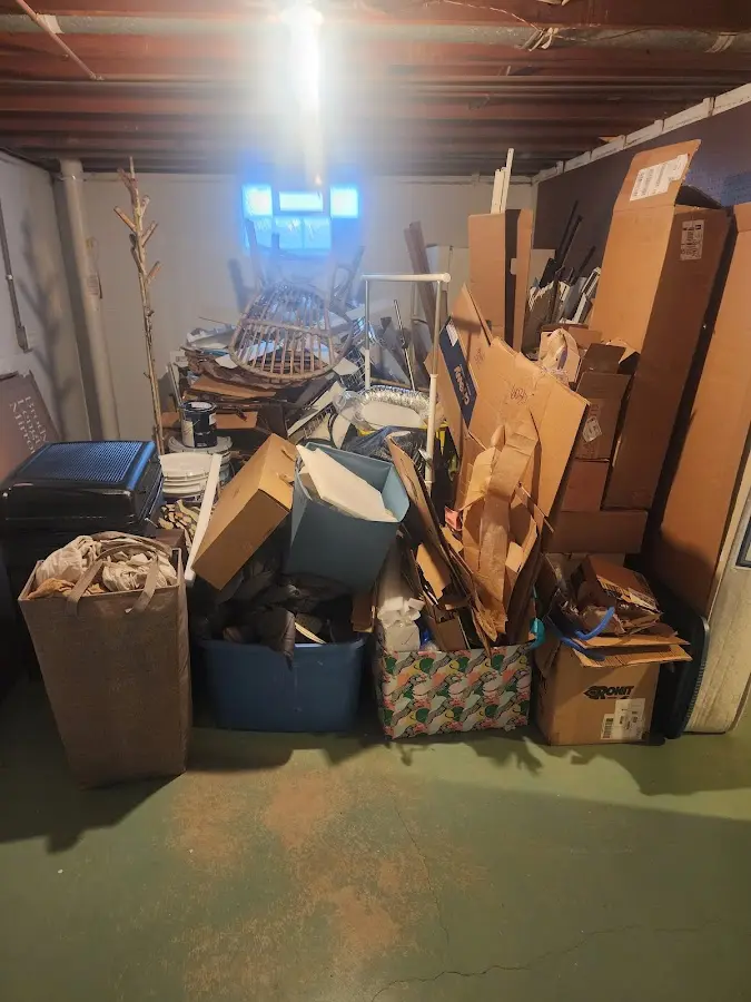 Roll-off dumpster container at job site for 2 Yard Dumpster Rental in Winston-Salem